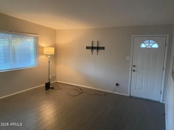 an empty room with windows
