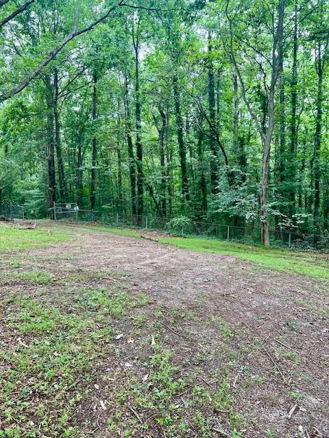 660 Hickory 3 Contiguous Trail Southeast Mableton, GA 30126 - Photo 11 of 35 a view of a field with trees in the background