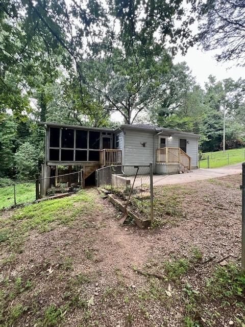 660 Hickory 3 Contiguous Trail Southeast Mableton, GA 30126 - Photo 14 of 35 a backyard of a house with garden and outdoor seating