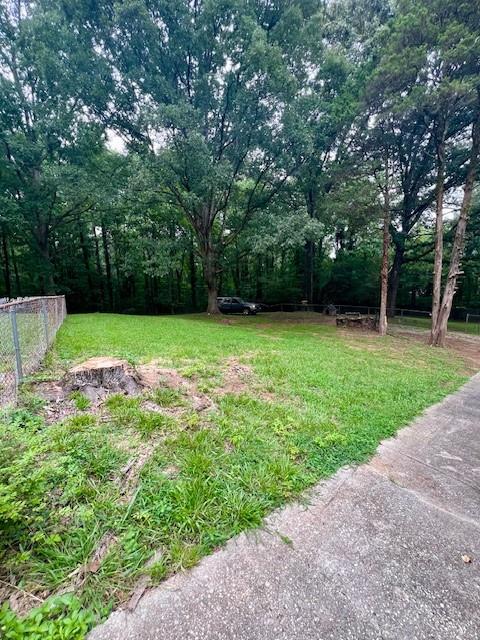 660 Hickory 3 Contiguous Trail Southeast Mableton, GA 30126 - Photo 7 of 35 a view of a backyard with a trees