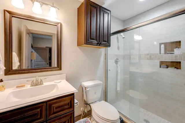 a view of a sink and a microwave