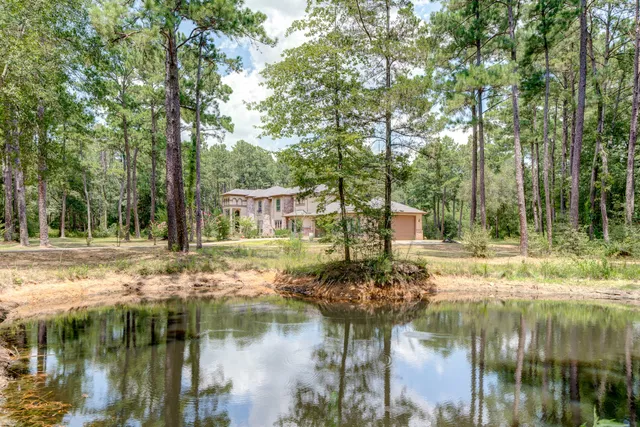 a view of a house with a swimming pool