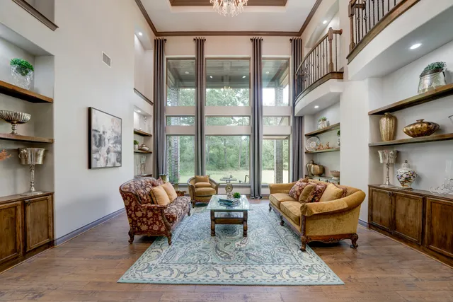 a living room with furniture and a rug