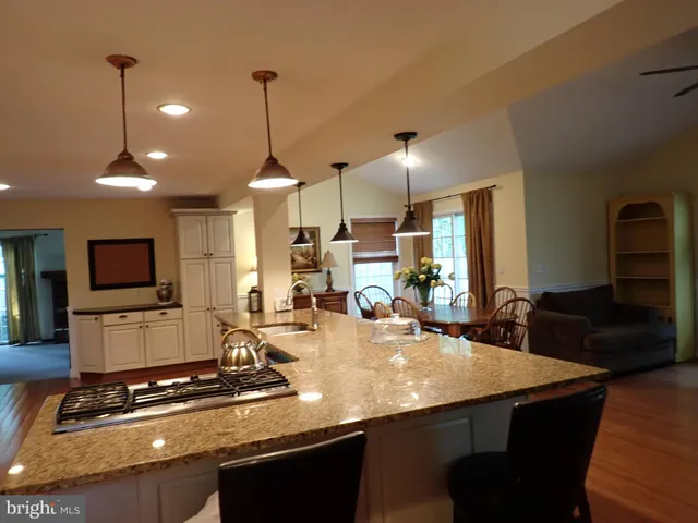 a kitchen with counter top space and stainless steel appliances