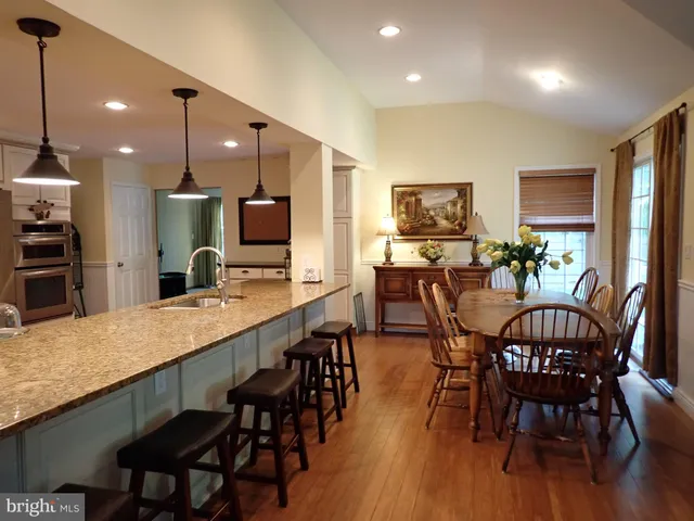 a view of a dining room with furniture