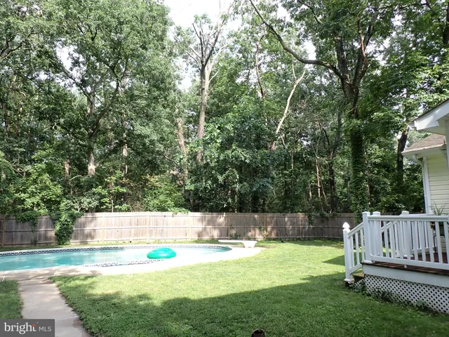 a view of a tiny house with a backyard
