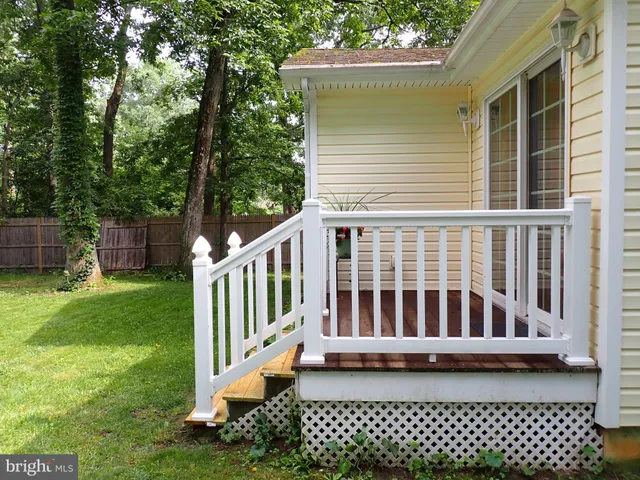 a view of a deck with a fence