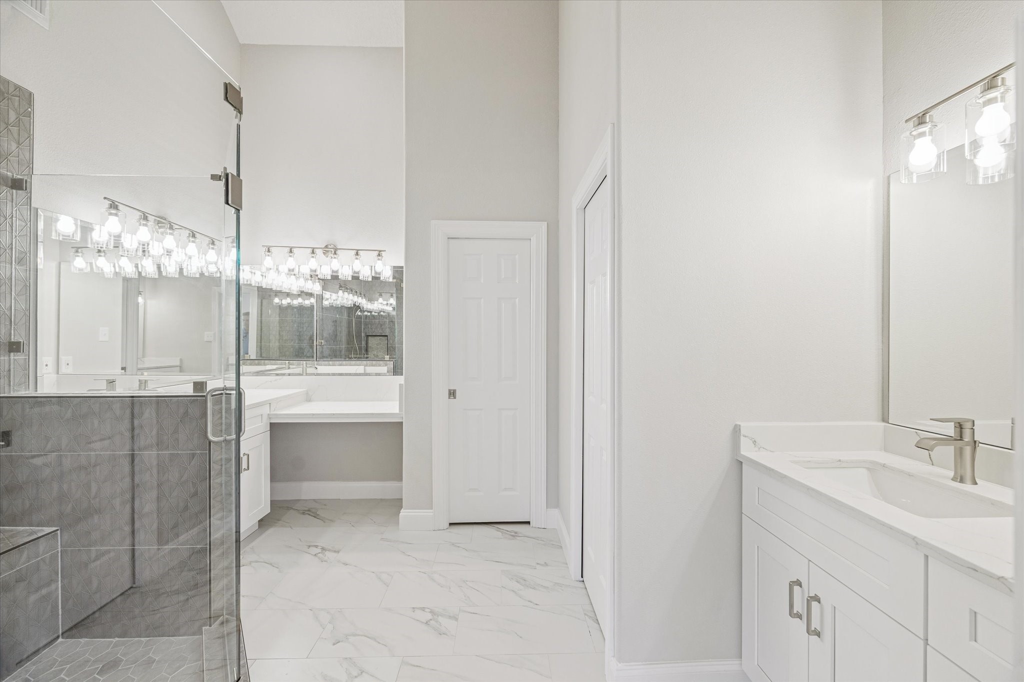 5437 Edgewater Court Willis, TX 77318 - Photo 15 of 29 a bathroom with a sink and a mirror
