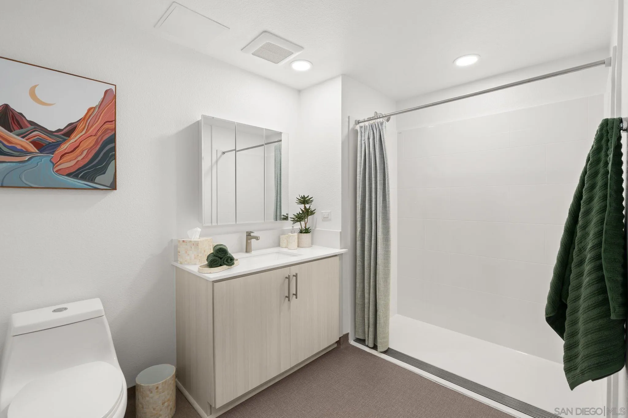 2724 El Cajon Boulevard, Unit 602 San Diego, CA 92104 - Photo 11 of 21 a bathroom with a sink toilet and shower