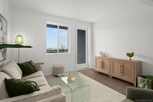 a living room with furniture and window