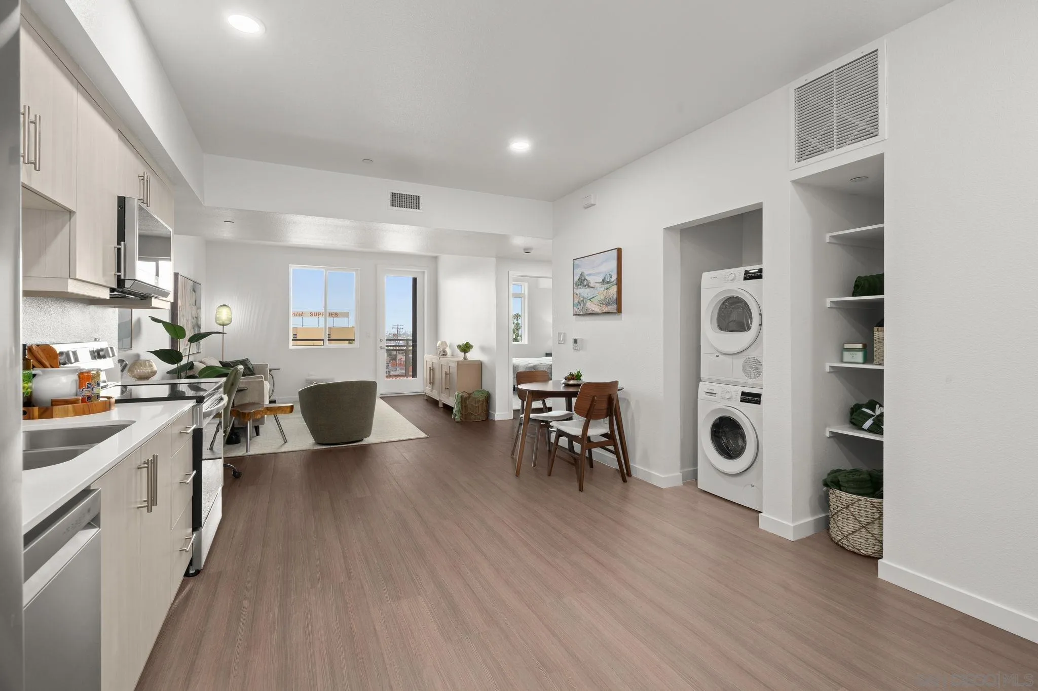 2724 El Cajon Boulevard, Unit 602 San Diego, CA 92104 - Photo 3 of 21 a living room with furniture dining table and wooden floor