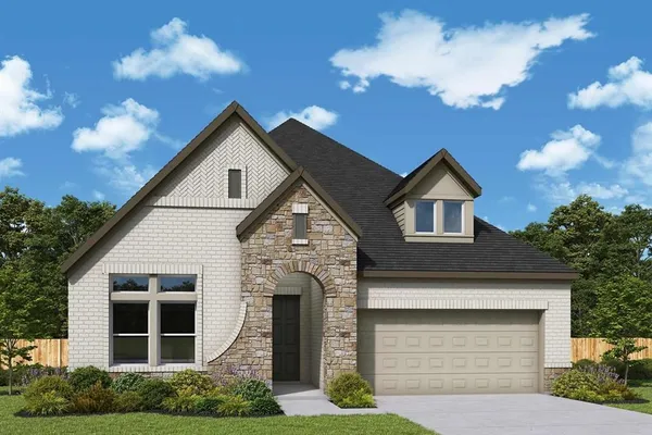 a front view of a house with garage and yard