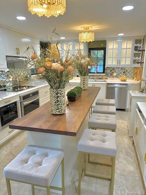 1661 Old Country Road, Unit 476 Riverhead, NY 11901 - Photo 10 of 25 Seating for six