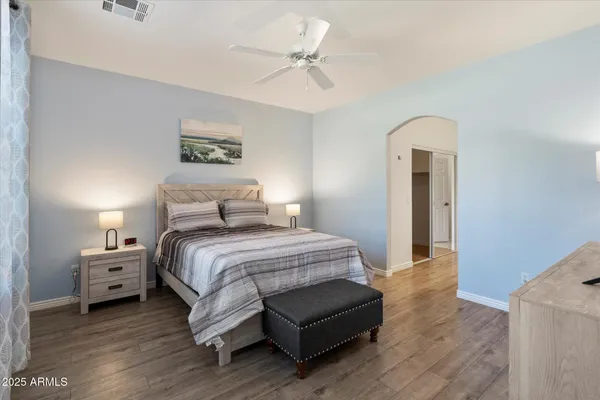 a view of a bathroom from a hallway