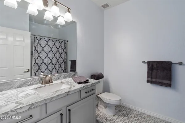 a swimming pool with outdoor seating and yard