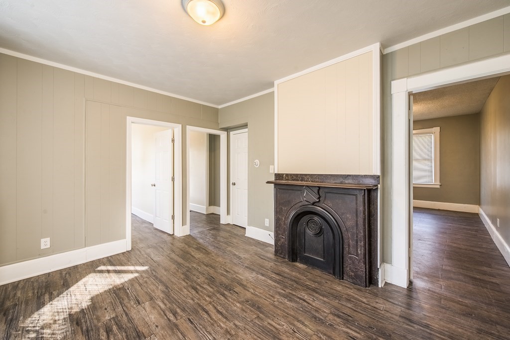 129 Florence Street Springfield, MA 01105 - Photo 6 of 16 a view of livingroom with furniture and fireplace