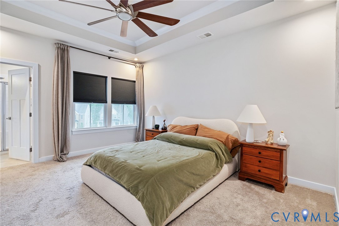1605 German School Road Richmond, VA 23225 - Photo 15 of 27 a bedroom with a bed and a ceiling fan