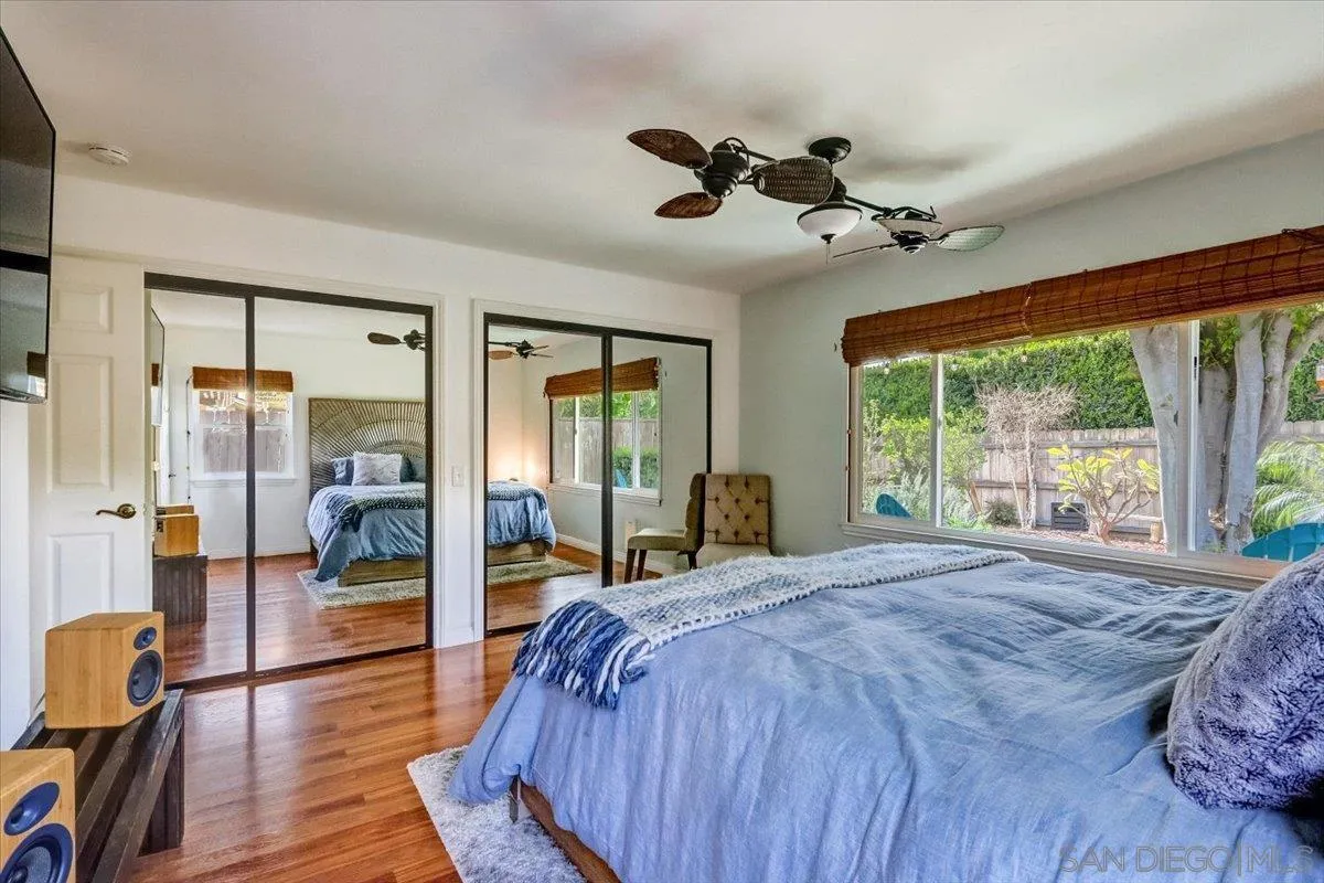 861 Shade Tree Lane Fallbrook, CA 92028 - Photo 21 of 49 a bed sitting in a spacious bedroom next to a window