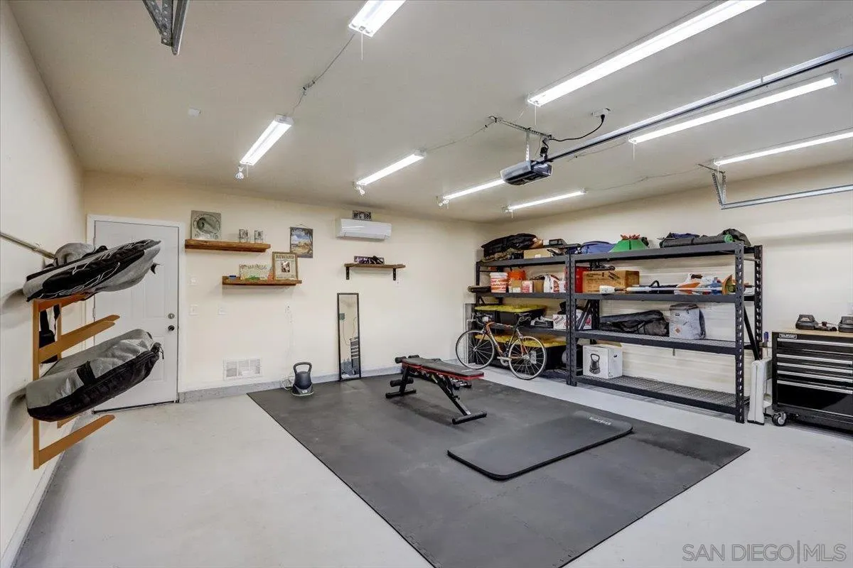 861 Shade Tree Lane Fallbrook, CA 92028 - Photo 24 of 49 a view of a room with gym equipment