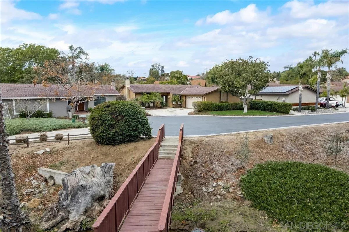 861 Shade Tree Lane Fallbrook, CA 92028 - Photo 39 of 49 a view of a house with a yard