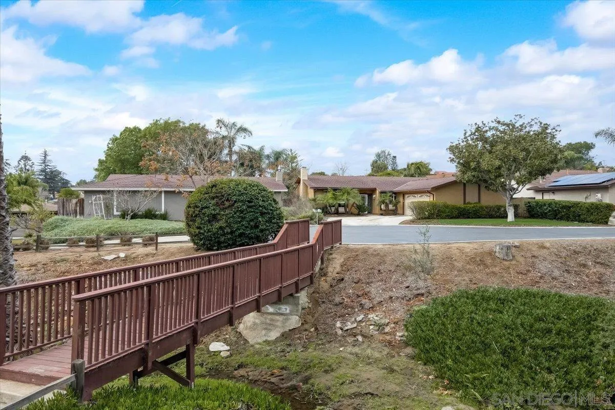 861 Shade Tree Lane Fallbrook, CA 92028 - Photo 40 of 49 a view of a house with wooden fence