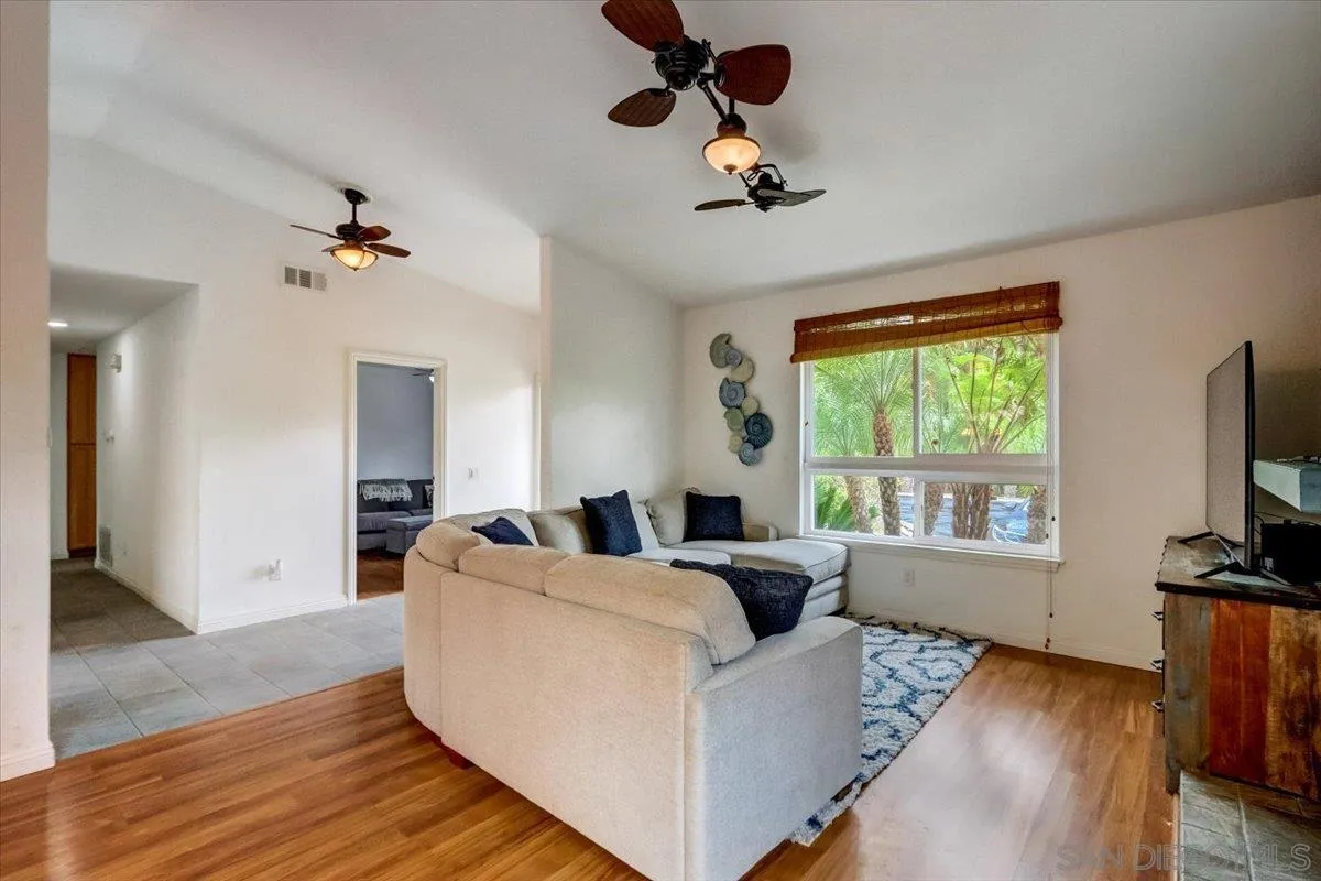 861 Shade Tree Lane Fallbrook, CA 92028 - Photo 6 of 49 a living room with furniture and a flat screen tv