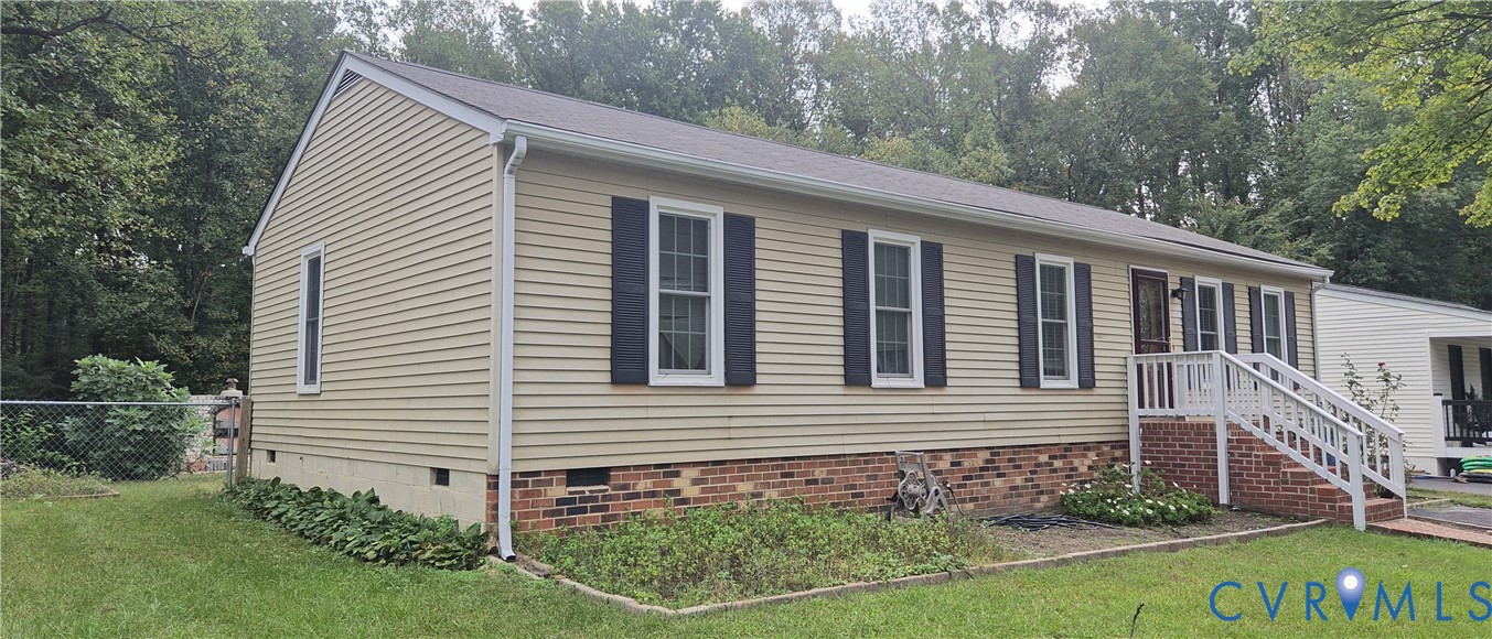 12409 Locustgrove Road Henrico, VA 23238 - Photo 4 of 40 Ranch-style residence featuring siding, a brick fo