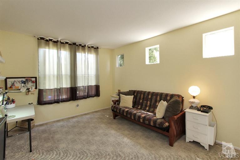 3853 Timberridge Road Moorpark, CA 93021 - Photo 20 of 42 a living room with furniture and a window