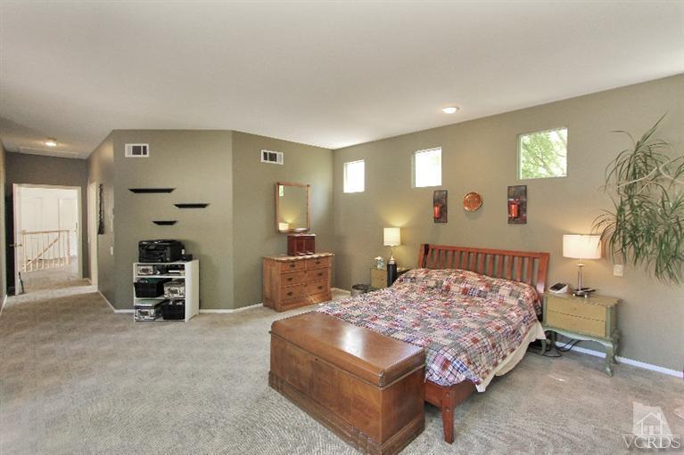 3853 Timberridge Road Moorpark, CA 93021 - Photo 28 of 42 a bedroom with a bed and a view of bathroom