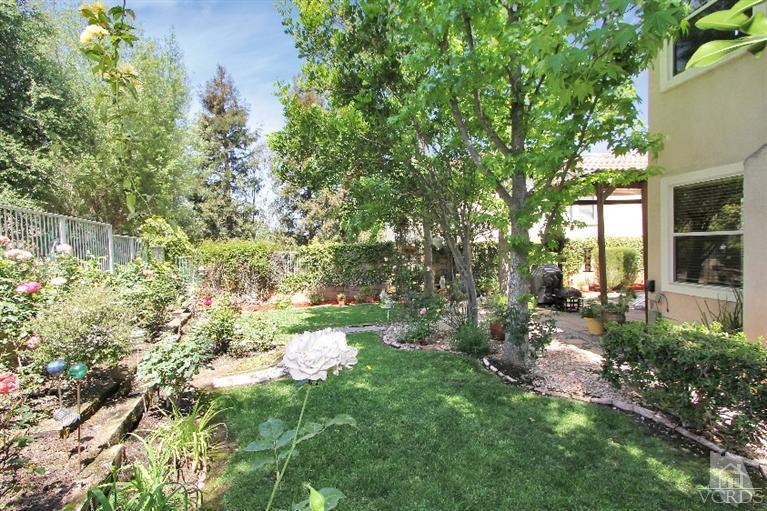 3853 Timberridge Road Moorpark, CA 93021 - Photo 36 of 42 a backyard of a house with table and chairs