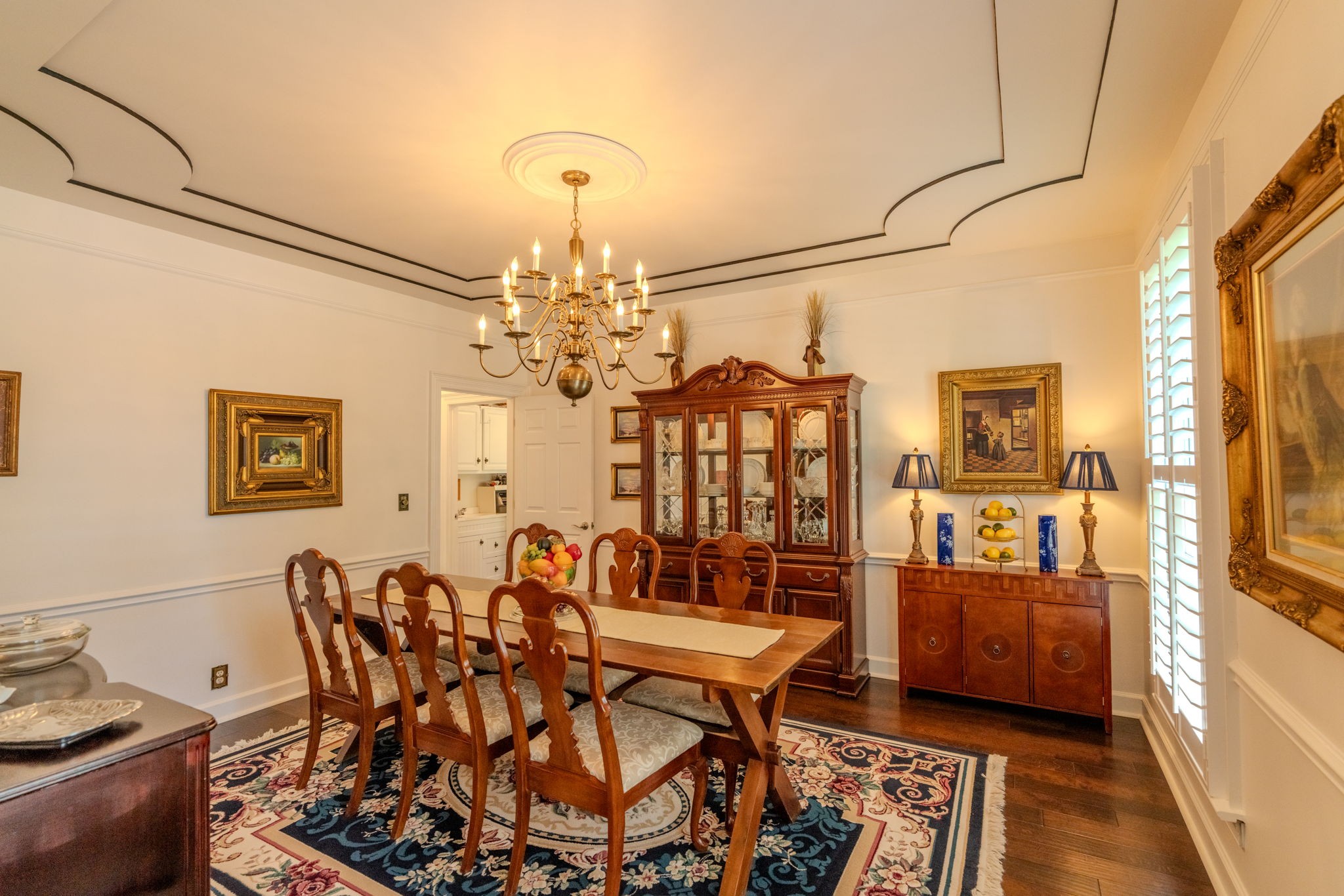 404 Chesterfield Place Franklin, TN 37064 - Photo 10 of 38 a view of a dining room with furniture and chandelier