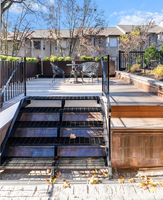 320 Tappan Street, Unit 4 Brookline, MA 02445 - Photo 16 of 18 a view of a building with sitting area