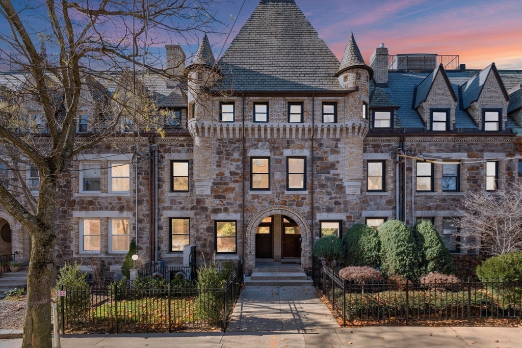 320 Tappan Street, Unit 4 Brookline, MA 02445 - Photo 18 of 18 view of a brick building next to a yard