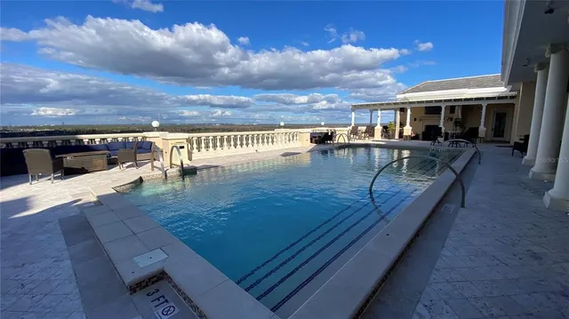 a view of balcony with furniture