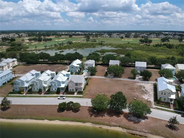 an aerial view of a house with a garden