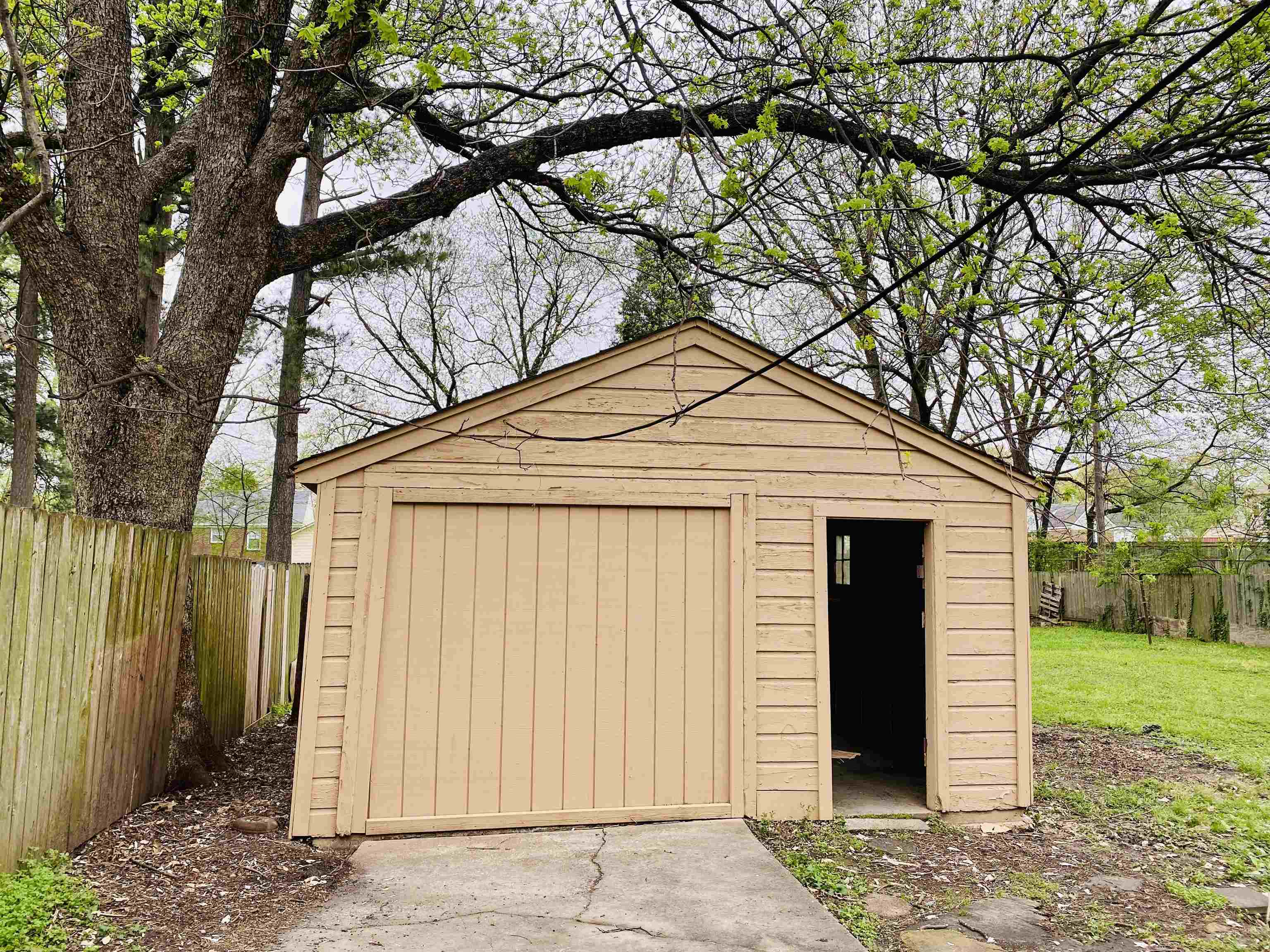 1253 Prescott Road Memphis, TN 38111 - Photo 13 of 13 a white house that has tree in front of it
