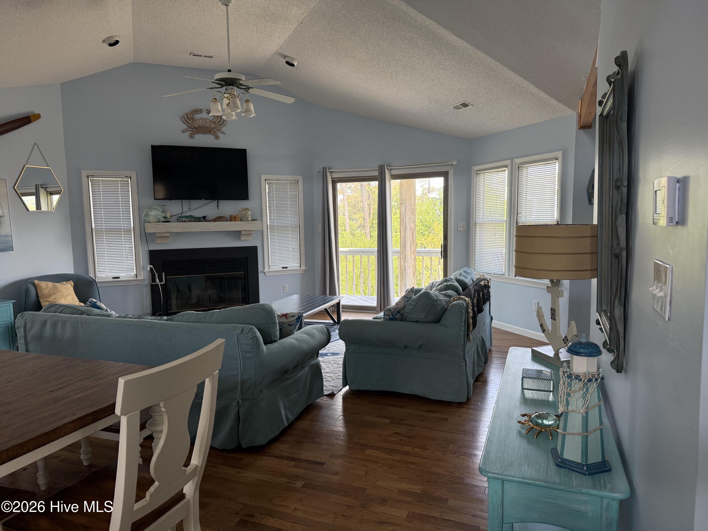 1037 Hampton Street Corolla, NC 27927 - Photo 5 of 39 Livingroom opens to deck
