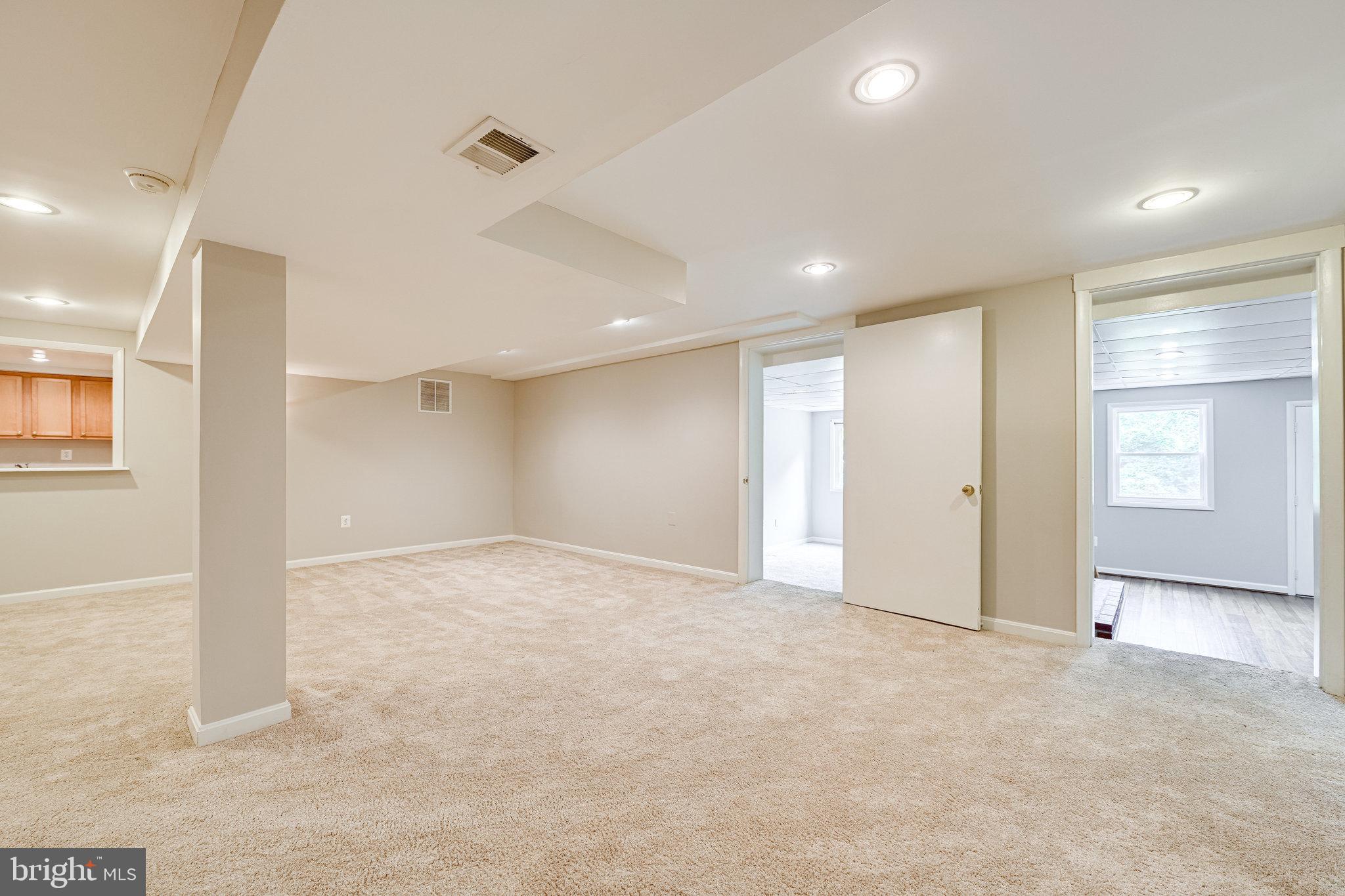 300 Branch Road Southeast Vienna, VA 22180 - Photo 48 of 72 Family room view from Movie Room to BRs & kit