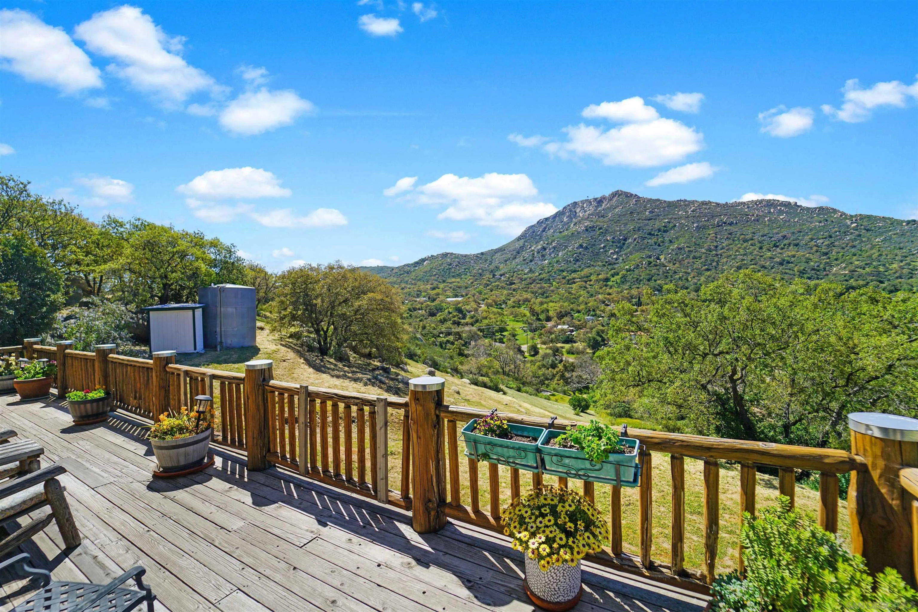 17508 Lyons Creek Road Jamul, CA 91935 - Photo 12 of 12 a view of a balcony with wooden floor and fence