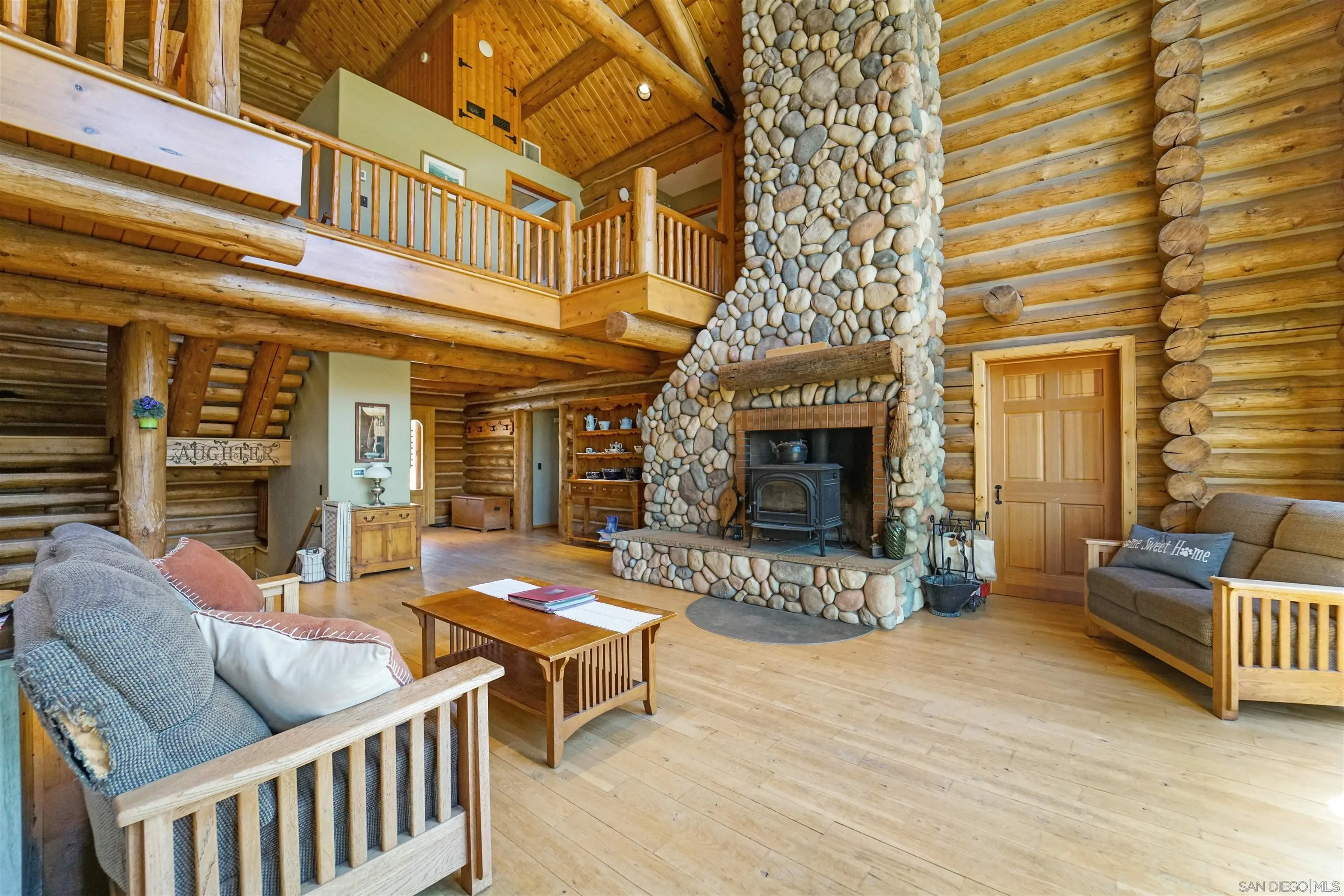 17508 Lyons Creek Road Jamul, CA 91935 - Photo 5 of 12 a outdoor living space with patio furniture and a fireplace