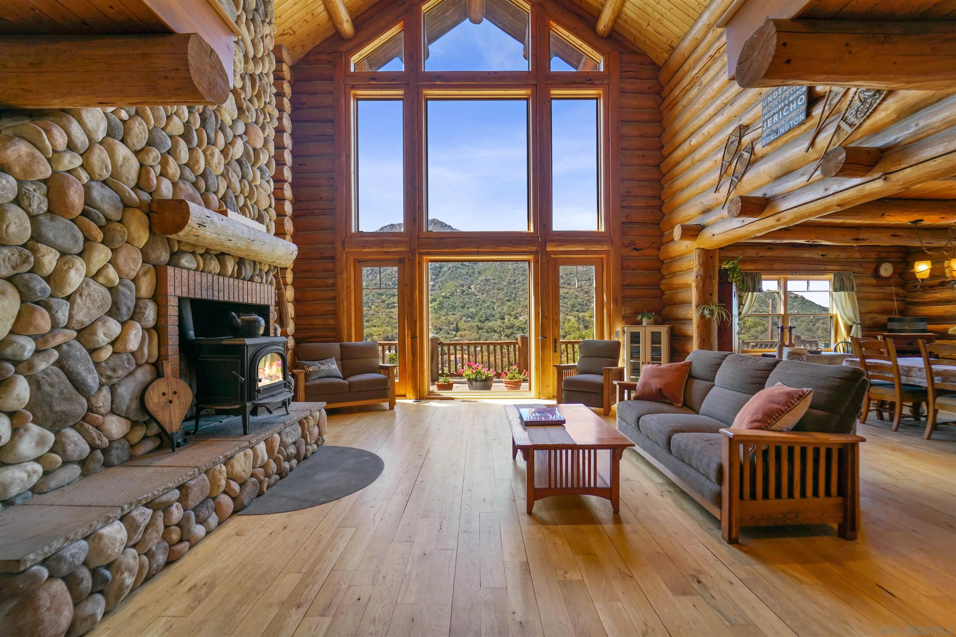 17508 Lyons Creek Road Jamul, CA 91935 - Photo 6 of 12 a living room with furniture fireplace and flat screen tv