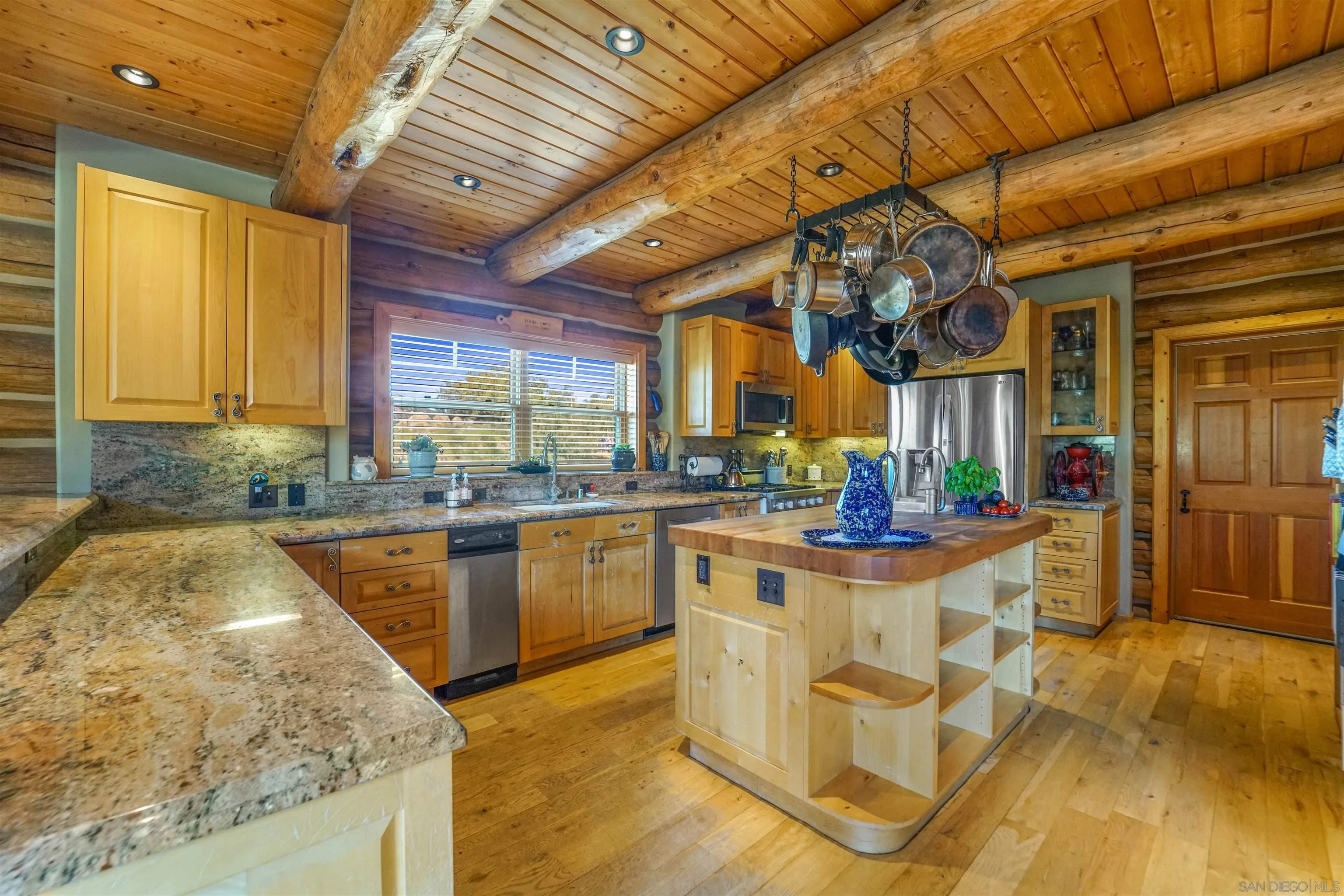 17508 Lyons Creek Road Jamul, CA 91935 - Photo 8 of 12 a kitchen with stainless steel appliances granite countertop a sink and cabinets