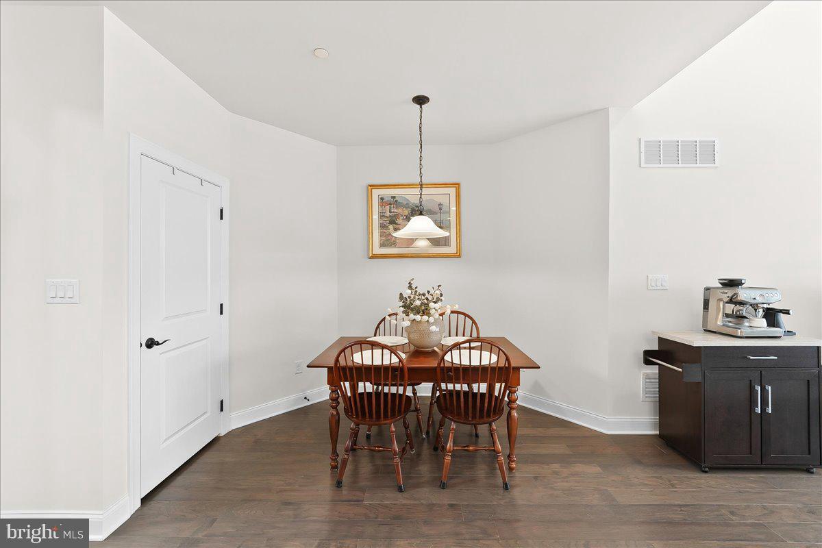 3718 Parris Boulevard Newtown Square, PA 19073 - Photo 14 of 52 a view of a dining room with furniture and chandelier