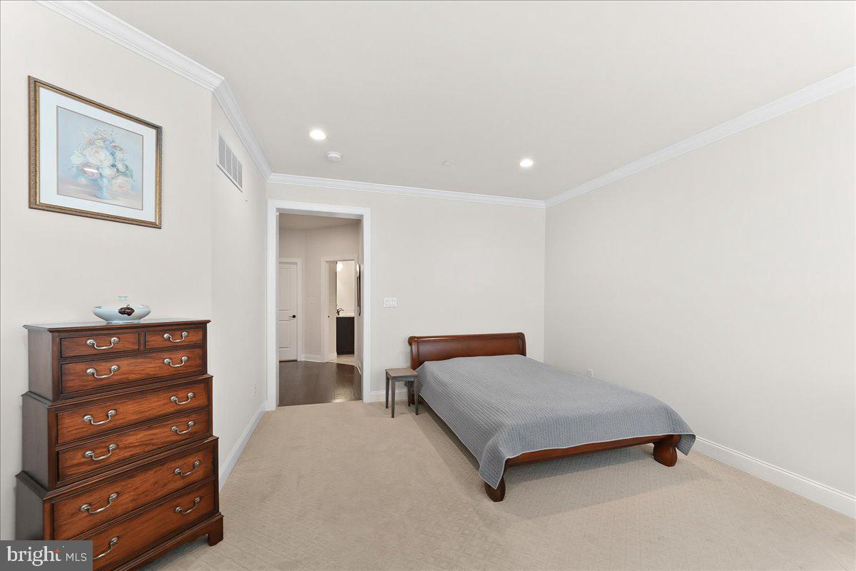 3718 Parris Boulevard Newtown Square, PA 19073 - Photo 22 of 52 a bedroom with a bed and a night stand