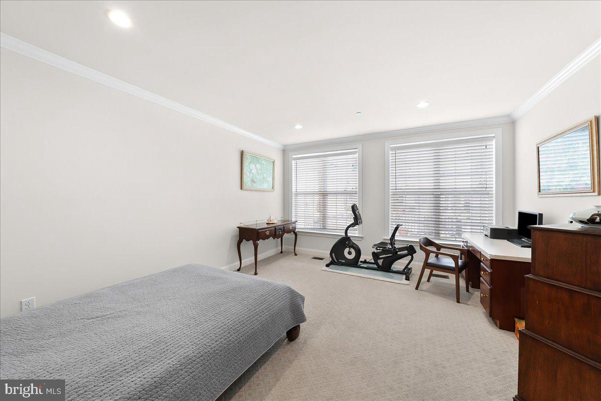 3718 Parris Boulevard Newtown Square, PA 19073 - Photo 23 of 52 a bedroom with furniture and a window