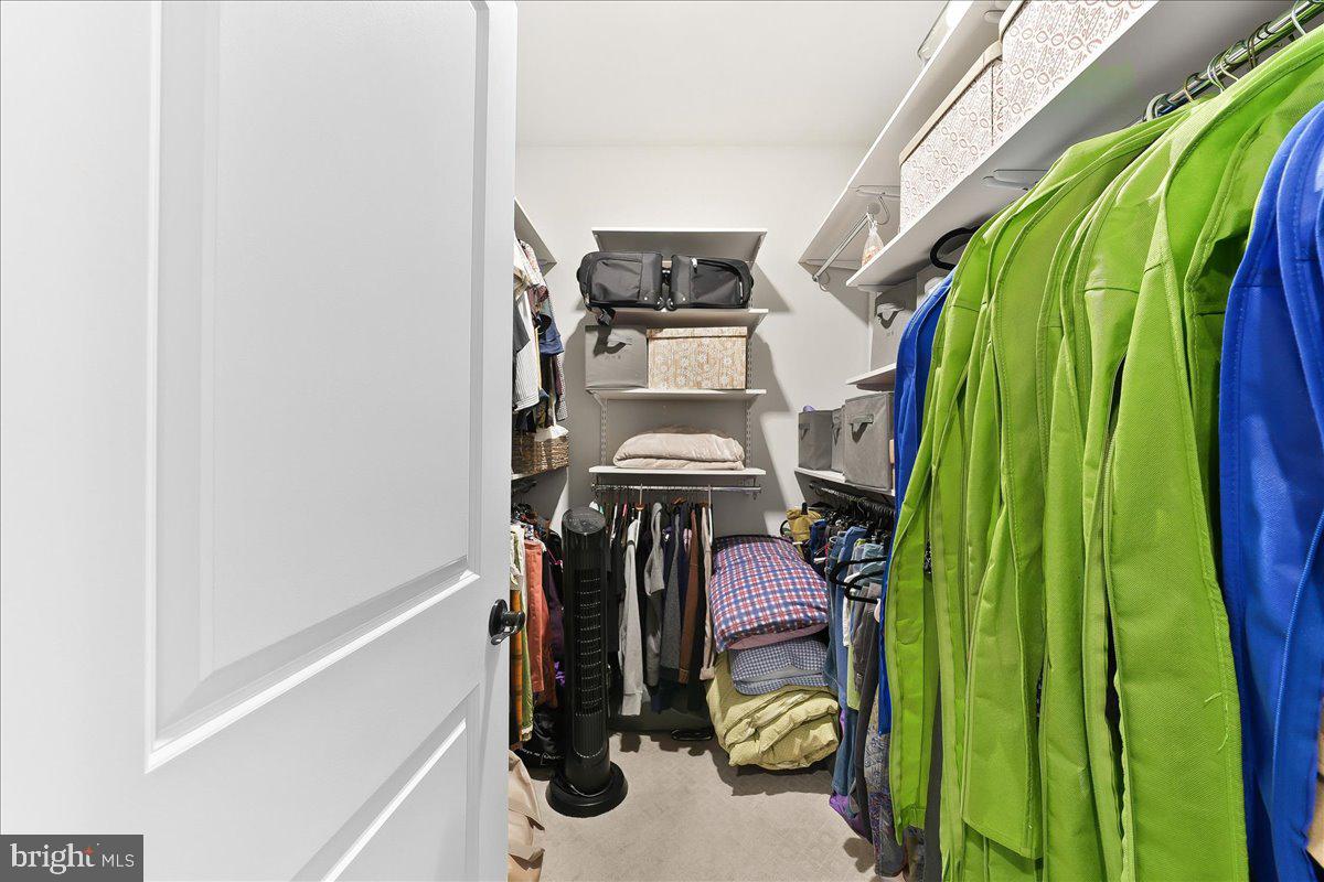3718 Parris Boulevard Newtown Square, PA 19073 - Photo 26 of 52 a view of walk in closet with clothes and shoes
