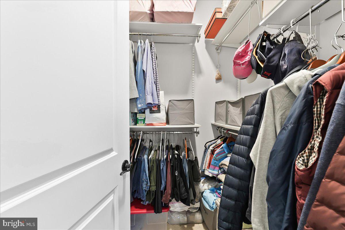 3718 Parris Boulevard Newtown Square, PA 19073 - Photo 27 of 52 a view of walk in closet with clothes and shoes