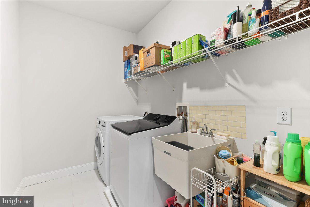 3718 Parris Boulevard Newtown Square, PA 19073 - Photo 29 of 52 a utility room with dryer and washer
