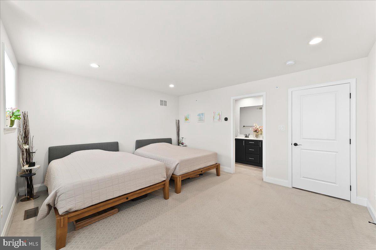 3718 Parris Boulevard Newtown Square, PA 19073 - Photo 36 of 52 a bedroom with two beds and painted walls