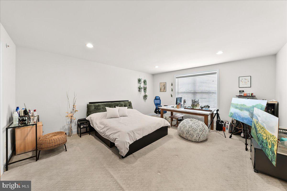 3718 Parris Boulevard Newtown Square, PA 19073 - Photo 39 of 52 a spacious bedroom with a bed and furniture